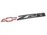 GM OEM 10154591 Rear End Finish Panel Z28 Emblem With Bowtie Rear Passenger (Right) Side               Black Lettering with Red Bowtie